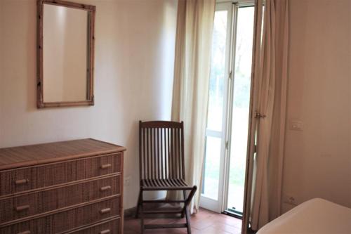 Ένα ή περισσότερα κρεβάτια σε δωμάτιο στο Residence La Canova II