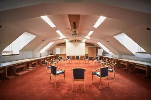 a room with a table and chairs in it at Hotel Donauhof in Emmersdorf an der Donau