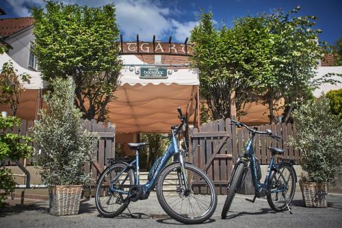 
a bicycle parked in front of a brick building at Hotel Donauhof in Emmersdorf an der Donau
