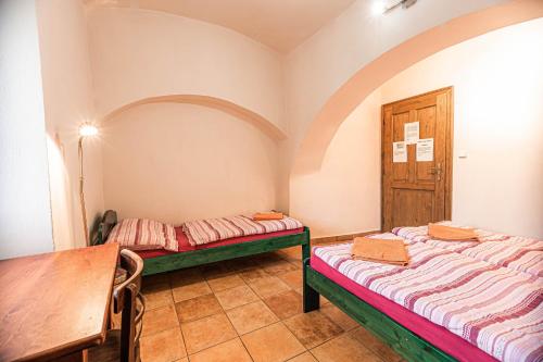 Postel nebo postele na pokoji v ubytování Hostel 99