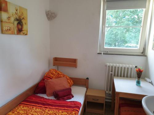 Uma cama ou camas num quarto em Herberge zur Herrlichkeit