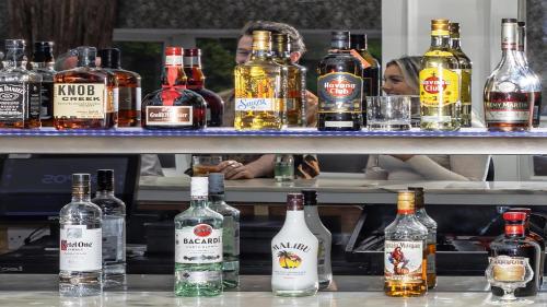 a group of bottles of alcohol on a shelf at Brook Lodge Boutique Hotel in Killarney