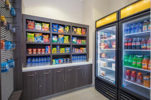 a store refrigerator filled with lots of food and drinks at La Quinta by Wyndham Chattanooga - East Ridge in Chattanooga