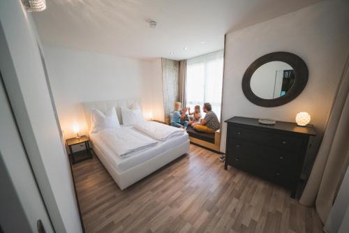Letto o letti in una camera di Dolomitenmannapartments