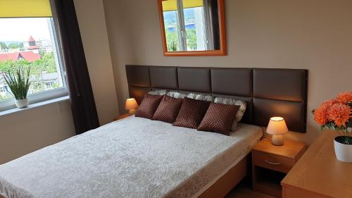 Säng eller sängar i ett rum på Apartamenty Podzamcze Wałbrzych