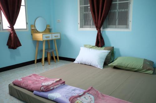 Postel nebo postele na pokoji v ubytování Little B house