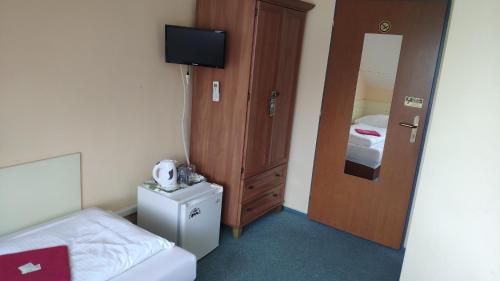 Postel nebo postele na pokoji v ubytování Pension & restaurant Silma with wellness