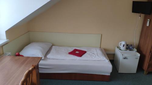 Postel nebo postele na pokoji v ubytování Pension & restaurant Silma with wellness
