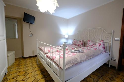 Кровать или кровати в номере B&B La Tana Dei Ricci