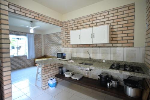 A cozinha ou cozinha compacta de Pousada Sítio Olho D'Água