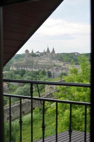 a view of carcassonne from a window of a castle at Brama Ruska in Kamianets-Podilskyi