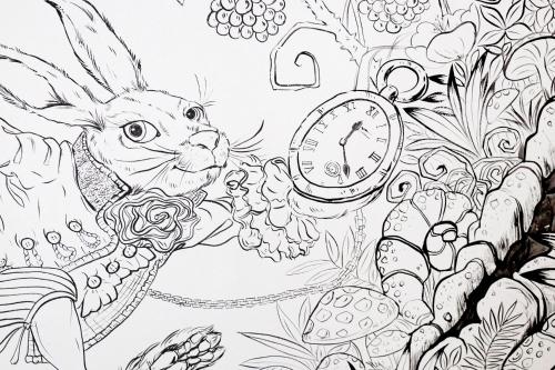 a coloring page of a rabbit in the garden with a clock at Hide and Seek Boutique Hometel in Bangkok