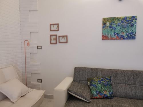 Ein Sitzbereich in der Unterkunft Appartamento Porta Lecce