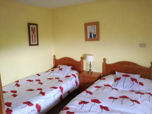 En eller flere senge i et værelse på Casa Banana