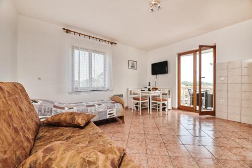 Postel nebo postele na pokoji v ubytování APARTMENT CAR UMAG