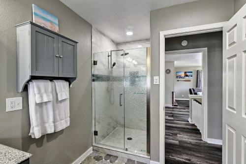 a bathroom with a shower and a glass shower stall at Spacious and Modern Family Duplex in Galveston! in Galveston