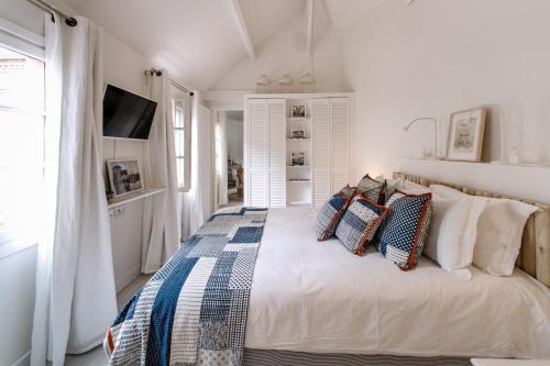 Ein Bett oder Betten in einem Zimmer der Unterkunft La maison de Colette, Traditionnelle Maison d'Armateur de 3 chambres et 3 salles de bains