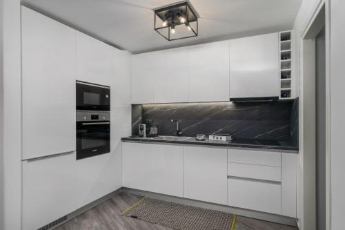 Η κουζίνα ή μικρή κουζίνα στο Margaret's Unique Apartment