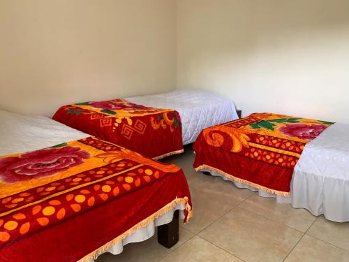 Postel nebo postele na pokoji v ubytování Hotel Maxim