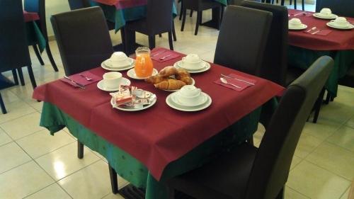 ห้องอาหารหรือที่รับประทานอาหารของ Hotel Giardino