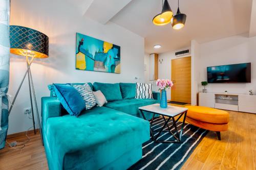 TV a/nebo společenská místnost v ubytování Lux Apartman MONET