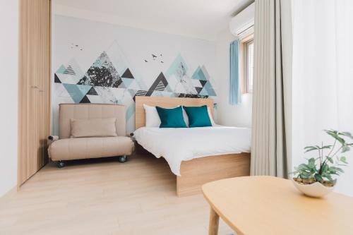 Voodi või voodid majutusasutuse Juso AFP Apartment Hotel toas
