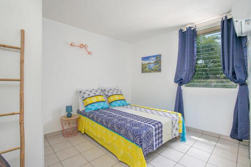 Postel nebo postele na pokoji v ubytování Appartement les pieds dans l'eau
