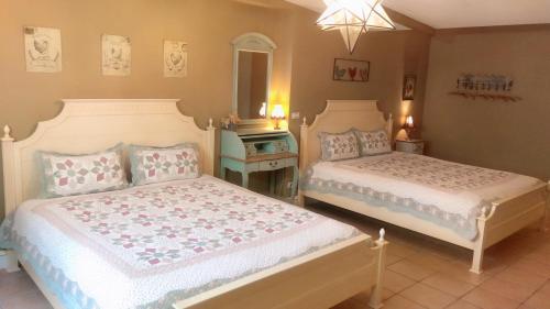 Postel nebo postele na pokoji v ubytování Fazhana Village B&B