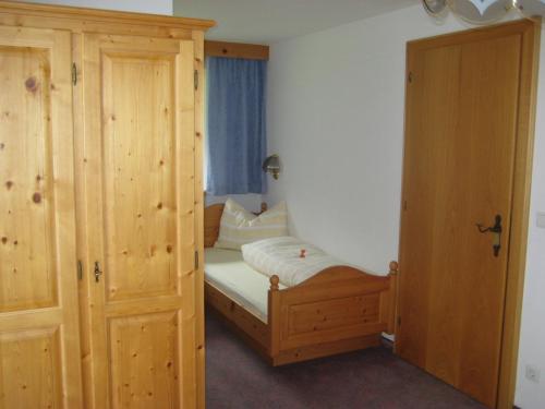 Ένα ή περισσότερα κρεβάτια σε δωμάτιο στο Machls Ferienwohnungen