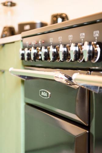 a close up of an oven in a kitchen at Landhuis Eikenburg in Ypres