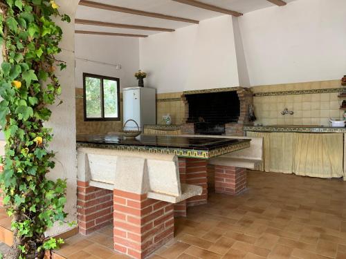 Kuchyň nebo kuchyňský kout v ubytování Villa Gómez