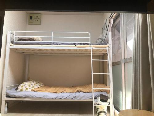 Cocone house Ohoriparkにある二段ベッド