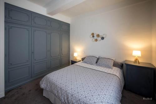 Katil atau katil-katil dalam bilik di Chambres d hôtes en Provence