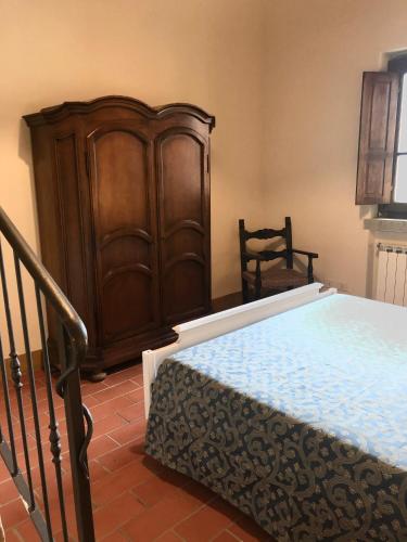 Ένα ή περισσότερα κρεβάτια σε δωμάτιο στο Agriturismo La Posta Reale