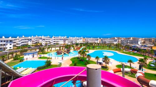 Bazén v ubytování Kenz Mehdia Hotel Resort nebo v jeho okolí