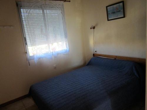 Postel nebo postele na pokoji v ubytování Apart climatisé T3 St Pierre la mer 1 er étage, 4 pers