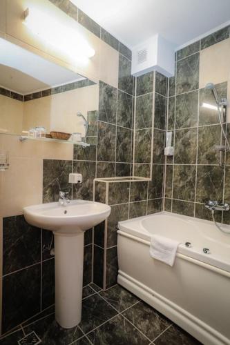 Koupelna v ubytování Hotel Pami