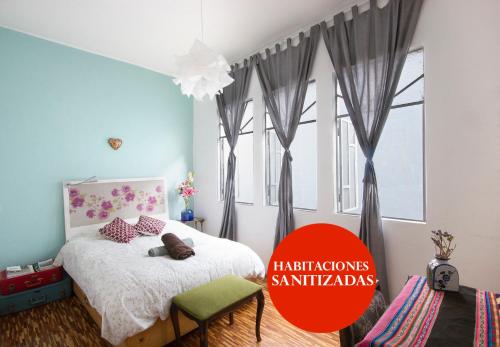 Ліжко або ліжка в номері Casa Índigo CDMX