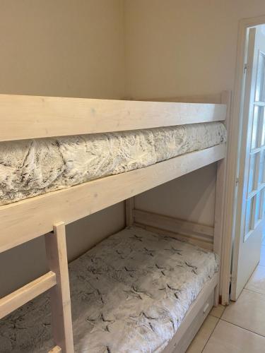 a bunk bed in a room at Apartment Genius Superior Ste Maxime 307 in Sainte-Maxime