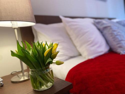 Cama o camas de una habitación en Good Time Apartments Warsaw - Świętokrzyska