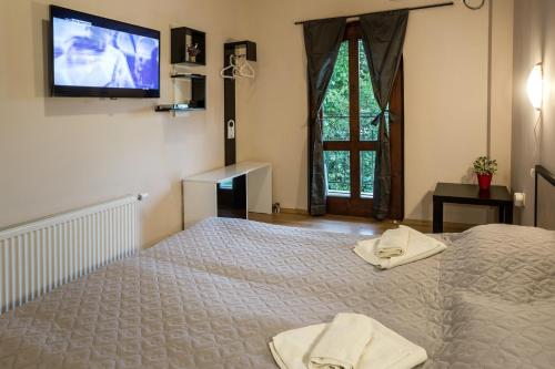 Postel nebo postele na pokoji v ubytování Hanovete Hotel