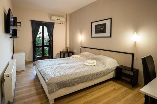 Postel nebo postele na pokoji v ubytování Hanovete Hotel