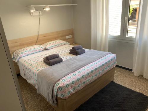 Una cama o camas en una habitación de Casa Baba