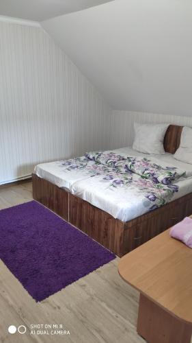 Postel nebo postele na pokoji v ubytování Ріточка