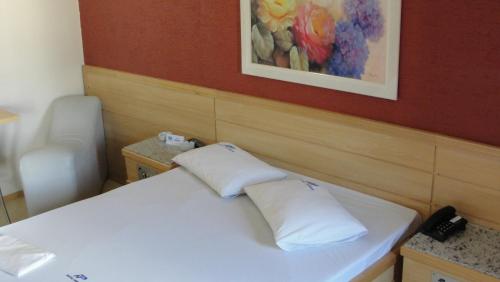 En eller flere senge i et værelse på Hotel Primor (Adult Only)