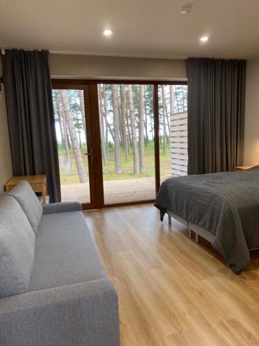 Postel nebo postele na pokoji v ubytování Valgeranna puhkekeskuse hotell