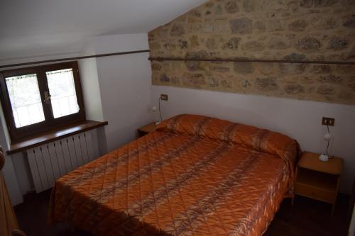 Postel nebo postele na pokoji v ubytování La casa di Pilato