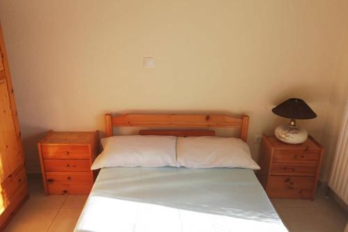 Postel nebo postele na pokoji v ubytování kallikratis apartment