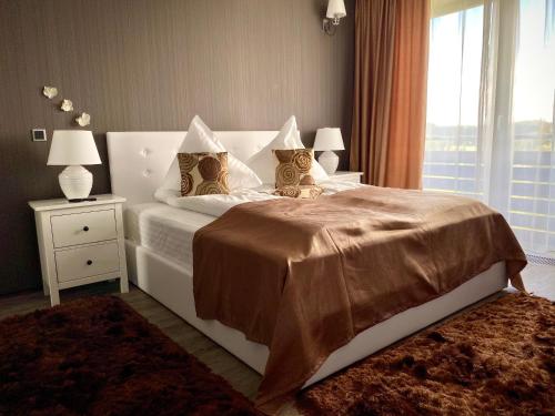 Ένα ή περισσότερα κρεβάτια σε δωμάτιο στο Happy Place