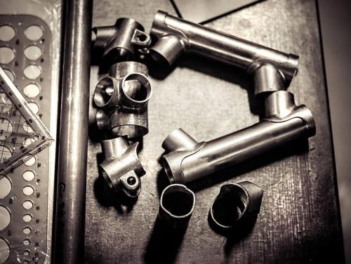 a pair of plumbing fittings on a metal wall at WELTRAD Am Fluß Restaurant & Quartier in Schönebeck